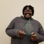 DeeDee poses with the Aspire Award